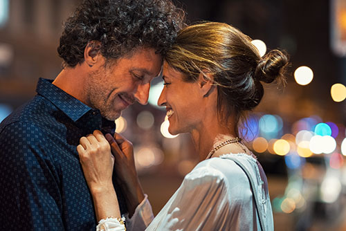 Romantic man and woman on evening date.